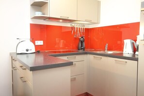 Apartment | Eigene Küche | Kühlschrank, Mikrowelle, Herdplatte, Geschirrspüler