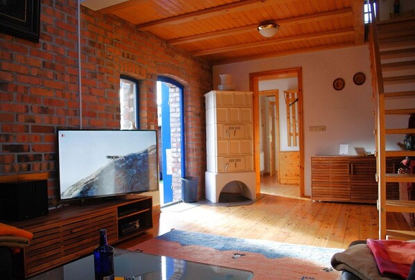 Ferienhaus | Wohnzimmer | Fernseher, Kamin, DVD-Player