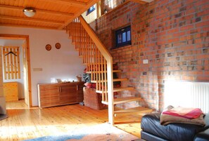 Ferienhaus | Wohnzimmer | Fernseher, Kamin, DVD-Player