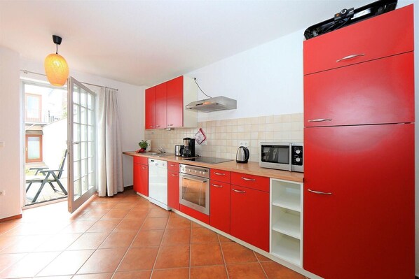 Appartement | Cuisine privée | Réfrigérateur, micro-ondes, plaque de cuisson, lave-vaisselle