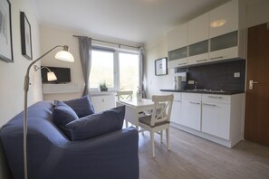 Ferienhaus | Wohnzimmer | Fernseher