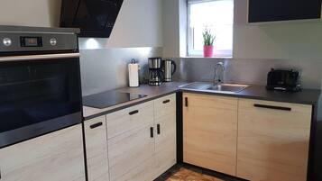 Apartment | Private kitchen | Fridge, dishwasher, coffee/tea maker