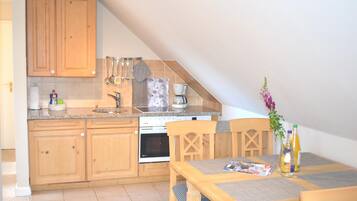 Apartment | Private kitchen | Fridge, stovetop, dishwasher