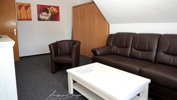 Apartment (Haus Königsdüne I-4) | Living room | TV