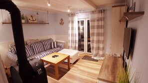 Ferienhaus (Ferienhaus "Feerjenkate-Fehmarn") | Wohnzimmer