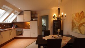 Apartment | Private kitchen | Fridge, microwave, stovetop, dishwasher