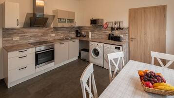 Apartemen | Dapur pribadi | Kompor dan mesin pencuci piring