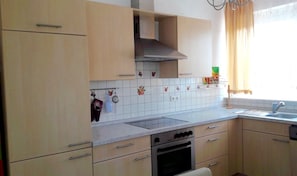Apartment | Private kitchen | Fridge, dishwasher, coffee/tea maker