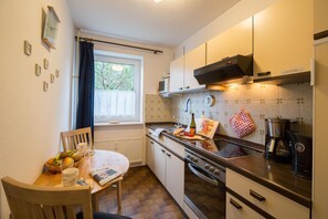 Apartment | Private kitchen | Fridge, microwave, stovetop, dishwasher