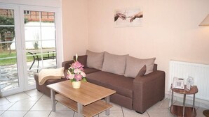 Apartamento | Sala de estar | TV