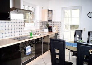 Appartement | Cuisine privée | Réfrigérateur, plaque de cuisson, cafetiÚre/bouilloire