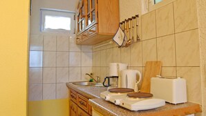 Apartment | Private kitchen | Coffee/tea maker, stovetop