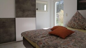 Apartemen | 1 kamar tidur dan tempat tidur bayi