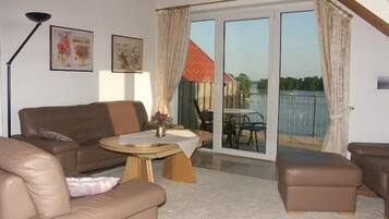 Apartment (FEWO Ammermann) | Living room | TV