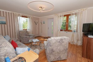 Apartment (Geschmackvoll ausgestattete Ferienwoh) | Wohnzimmer