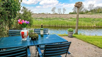 Bungalow, 3 Bedrooms, Terrace, Garden View | Outdoor dining