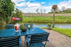 Bungalow, 3 habitaciones, terraza, vistas al jardín | Restaurante al aire libre
