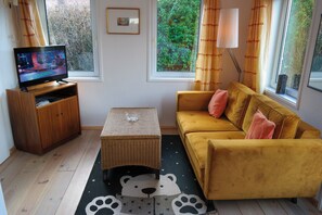 Bungalow, 2 Bedrooms, Terrace, Garden View | Living room | Books - Charming Holiday Home 40m2 Near the Lauwersmeer (Anjum)