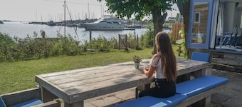 8 Pers Chalet Carla in Front of the Lauwersmeer and own Fishing Pier