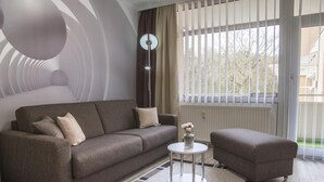 Apartamento | Sala de estar | Una televisión, un reproductor de DVD