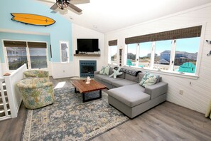 Flat-screen TV, fireplace, DVD player, stereo