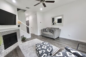 Flat-screen TV, fireplace