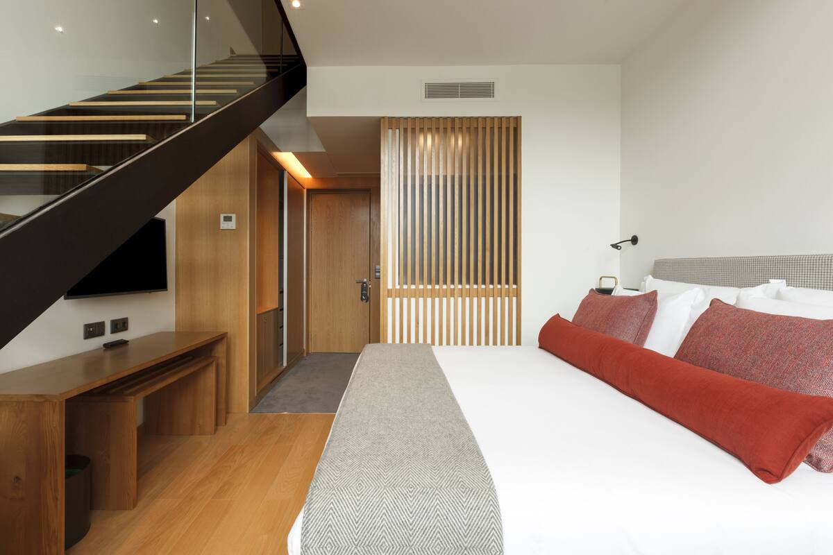 Superior Suite (Duplex) | Minibar, in-room safe, desk, blackout drapes