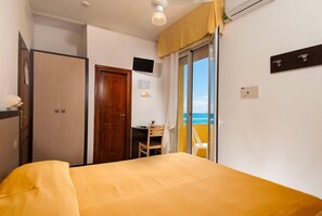 Quadruple Room, Balcony | Desk, bed sheets
