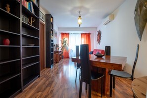 Apartment, 1 Bedroom, Balcony | Living area | Flat-screen TV