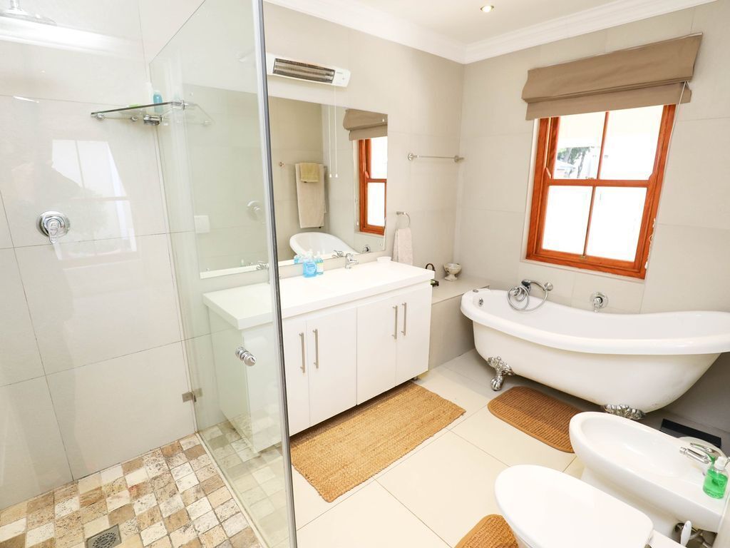 Bathtub, hair dryer, towels