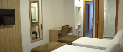 Deluxe Triple Room | Minibar, desk, laptop workspace, free WiFi