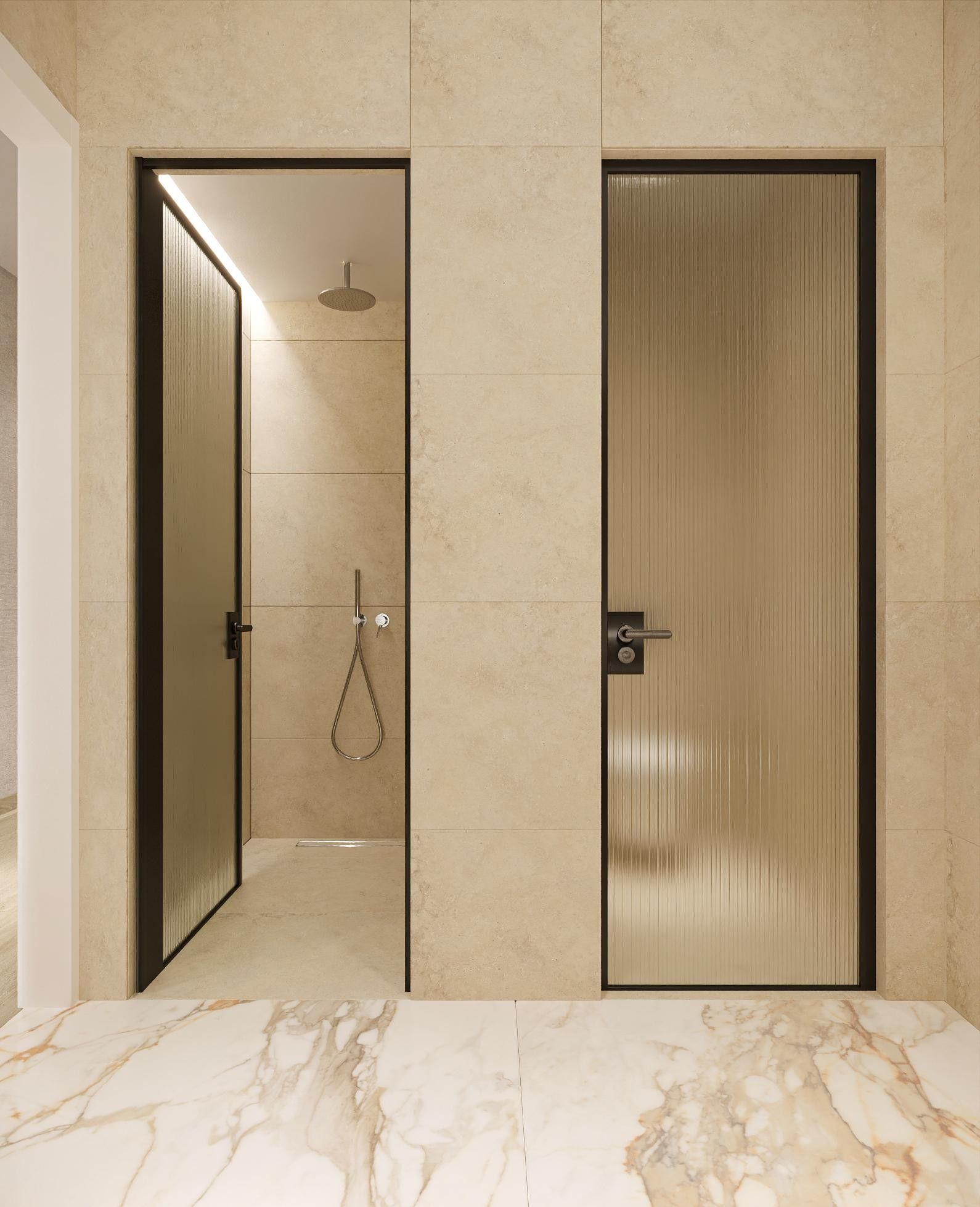 Une salle de bain moderne équipée d’une douche, de toilettes et d’un lavabo.