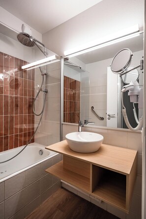 Hair dryer, towels, soap, toilet paper