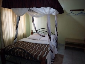 Desk, iron/ironing board, bed sheets - Talents Hotel (Kitui)
