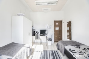 Basic Double Room, Shared Bathroom | Individually decorated, individually furnished, desk, blackout drapes