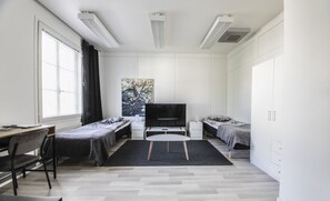 Family Room, Private Bathroom | Living area