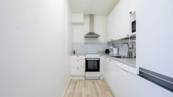 City Apartment, 3 Bedrooms | Private kitchen | Fridge, microwave, coffee/tea maker, electric kettle