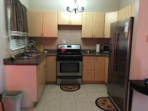 Fridge, oven, cookware/dishes/utensils - Two Bedroom Townhouse In Caribbean Estate (Portmore)