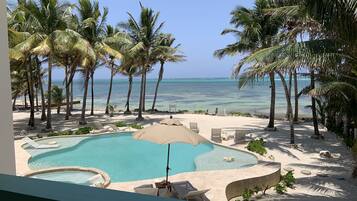 Superior Condo | Pool | Outdoor pool, open 8:00 AM to 10:00 AM, sun loungers