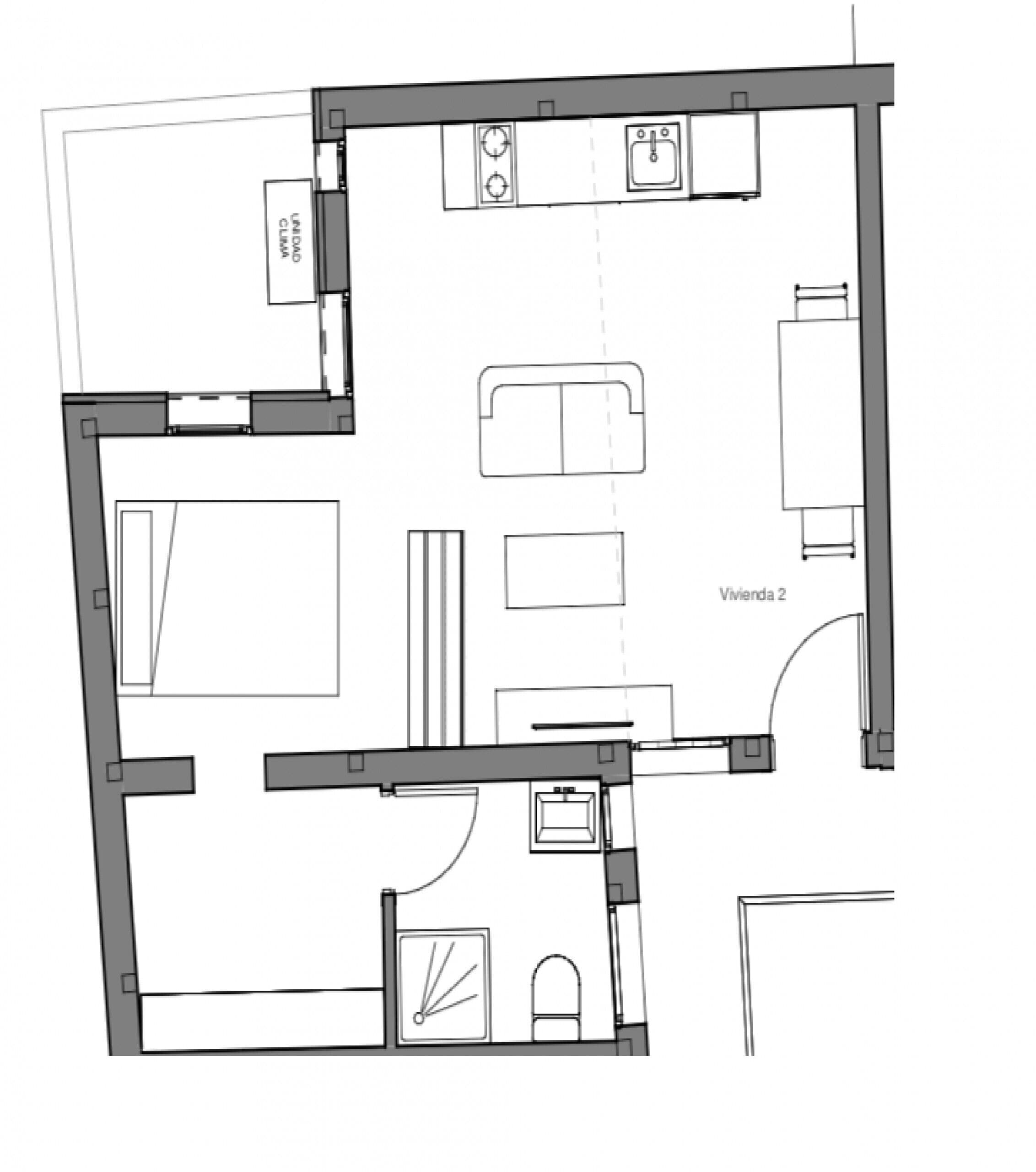 A floor plan of a hotel room with a bathroom, kitchenette, and a living area.