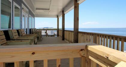 Experience waterfront living at The Pointe in Grand Isle, LA, with 4 bedrooms and boat access.