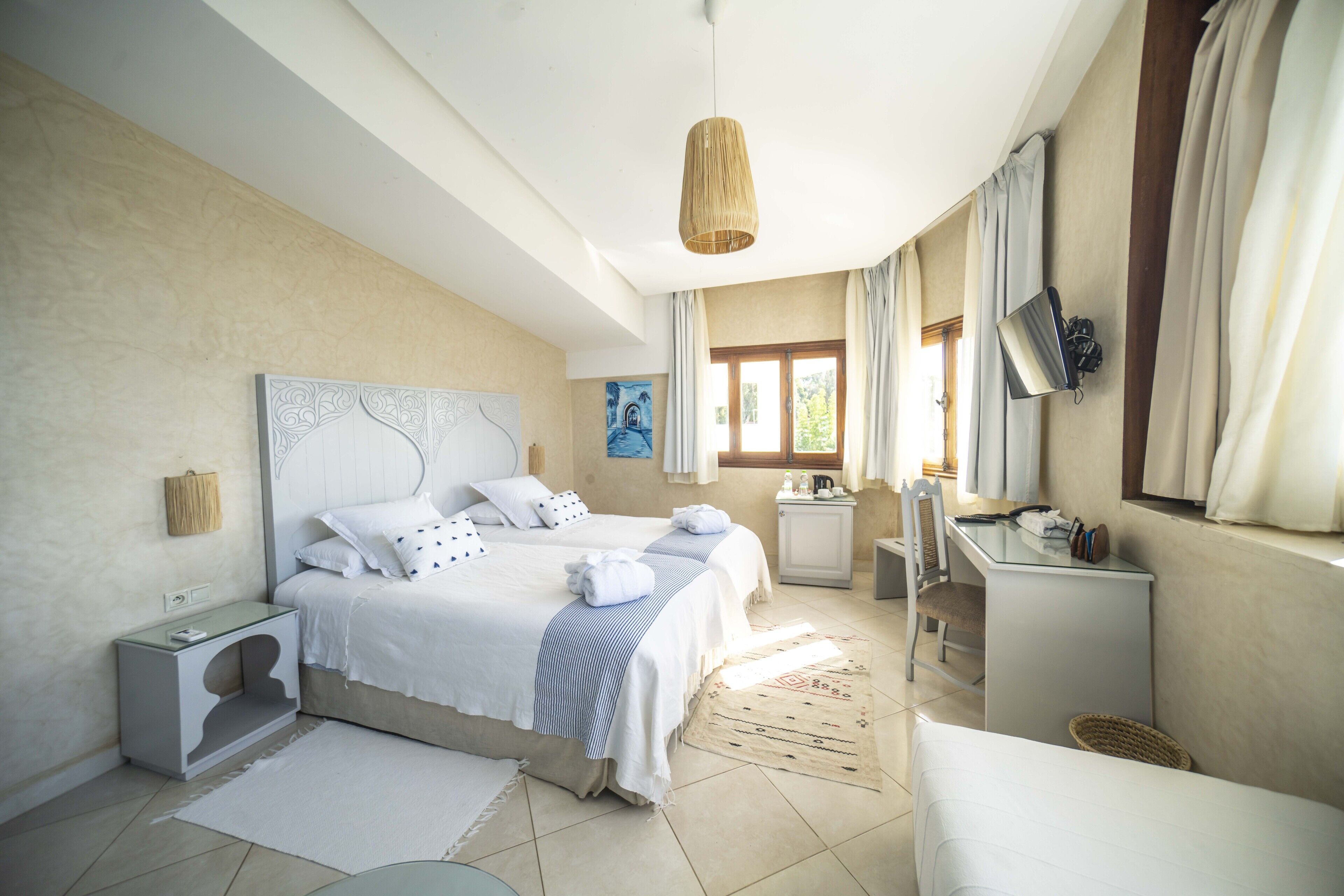 superior twin room (adouz) | in-room safe, bed sheets