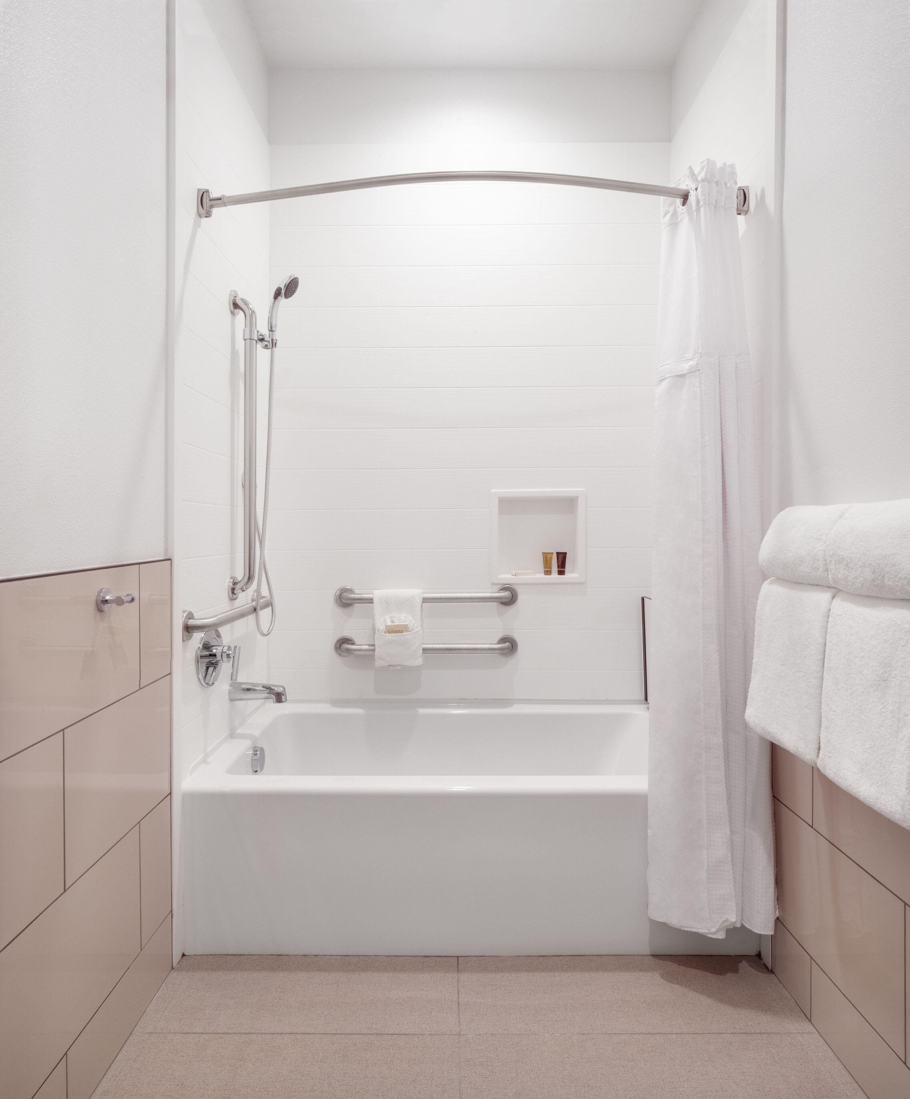 combined shower/bathtub, free toiletries, towels