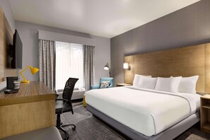 Premium bedding, down duvets, pillow-top beds, in-room safe