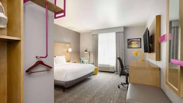 Premium bedding, down comforters, pillowtop beds, in-room safe
