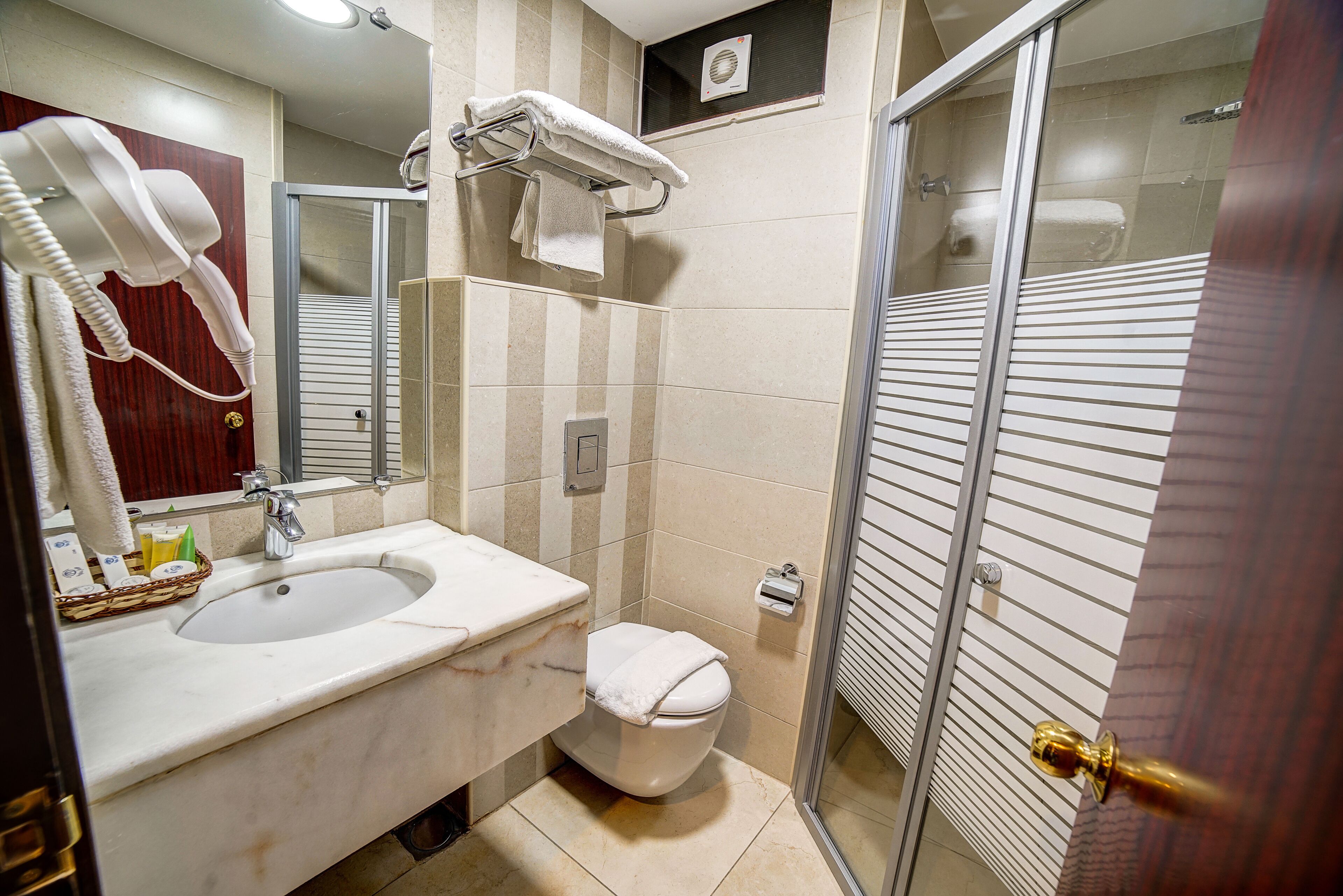 family suite | bathroom | shower, rainfall showerhead, free toiletries, hair dryer