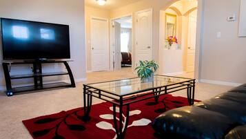 House (Trafalgar Resort community pool and G) | Living room | 1-inch TV with cable channels