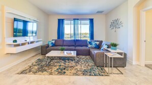 House (Brand New Condo at Champion Gate with) | Living room - Natural Breeze by Orlando Short Term (Davenport)