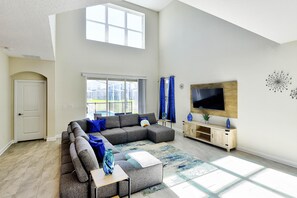 House (Champion Gate Brand New Home with Pri) | Living room | TV - Beach Retreat by Orlando Short Term (Davenport)
