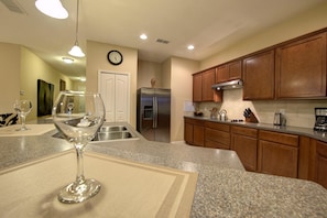 House (Gated Community! Sparkling private po) | Private kitchen | Fridge, microwave, oven, stovetop - Sunset Lake Villa by Orlando Short Term (Kissimmee)